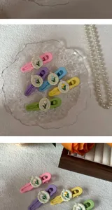 Chic pastel tulip hair clips set, cute floral duckbill clips for styling sweet daily bangs.