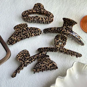 Leopard print hair claw clip set, trendy acetate hair accessories for women styling and daily updos.