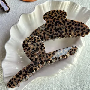 Elegant leopard print hair claw clip set, stylish acetate shark clip for women's chic updos.