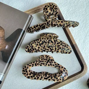 Leopard print hair claw clip set, elegant resin shark clips for women styling and daily wear.