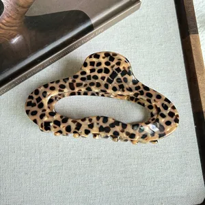 Leopard print hair claw clip for women, stylish cloud shape hair accessory, chic daily wear.