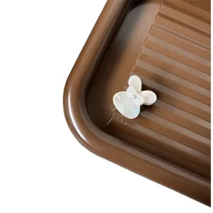 Sweet white acetate hair claw clip with bow design, small cute hair accessory for daily wear.