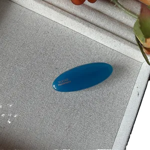 Fermaglio per capelli ovale blu, elegante mini molletta per frangia e styling laterale, accessorio.