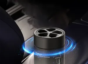 Detail view of black solid car air freshener with honeycomb lid and long-lasting scent.