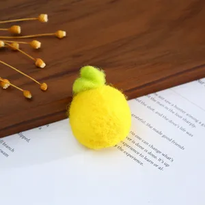 Yellow wool felt craft detail showing soft texture and cute handmade accessory design for DIY.