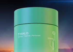 Detail view of green solid car perfume container featuring refreshing nature scent and elegant design.