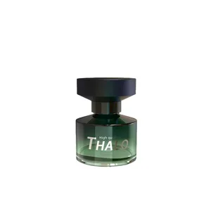 Car air freshener glass perfume bottle diffuser with elegant green design for vehicle interior.