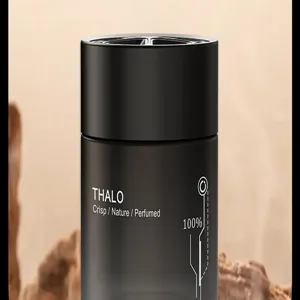 Car solid perfume diffuser close-up detail, black cylindrical container with nice texture display.