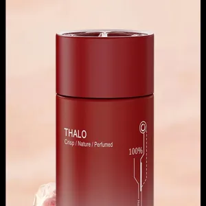 Car solid perfume air freshener detail, dark red cylindrical container, long lasting fragrance.