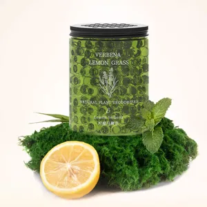 Lemon verbena natural plant deodorizer bead jar detail view with fresh lemon and moss props.