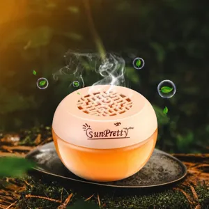 Household aromatherapy air freshener with long lasting fragrance, pink and orange jar design.