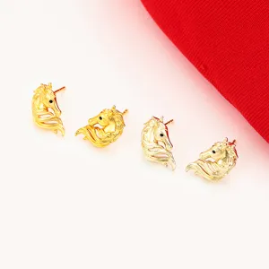 Elegant gold horse stud earrings crafted from copper alloy with fine detailing for women.