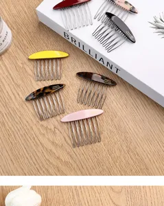 Detailed shot of colorful acetate side hair combs with metal teeth, perfect for bangs and updos.