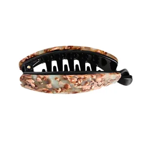 Minimalist acetate banana hair clip tortoiseshell hair claw for women daily styling.