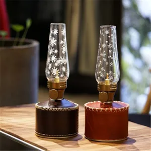 Housse en cuir pour réservoir de gaz de camping avec abat-jour en verre décor flocons.