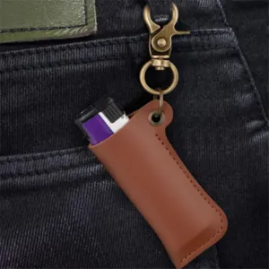 Vintage brown leather lighter sleeve with bronze metal clasp, universal protective case.