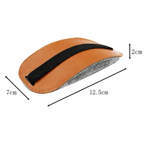 Detail view of the brown PU leather and grey felt mouse case with elastic strap for magic mouse.