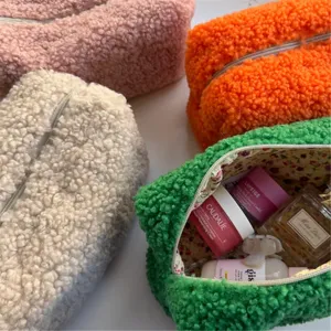 Fluffy teddy fleece cosmetic pouch with cute floral lining, large capacity makeup storage bag.
