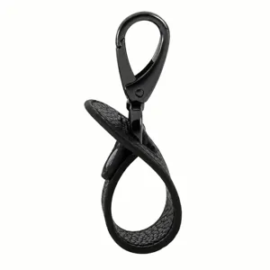 Black leather hat clip for travel and outdoor walking, portable backpack hook and luggage accessory.