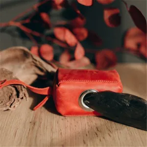 Red leather dog poop bag holder pet waste bag dispenser with metal eyelet and strap