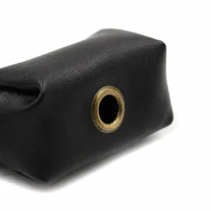 Leather dog poop bag dispenser black pet waste bag holder with metal grommet detail view