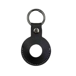Black leather protective case for AirTag tracker with metal keyring and snap button closure.