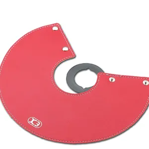 Red leather camping lantern shade detail, portable tent light cover with metal snaps for outdoor hiking.