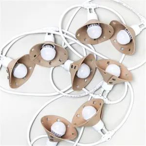 Vue détaillée guirlande lumineuse abat-jour étoile en cuir, éclairage camping extérieur LED.