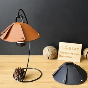 Leather camping lamp shade detail view, portable retro light cover with metal stand for outdoor.