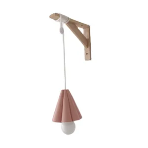 Wooden wall bracket with pink pleated lampshade hanging light for home or camp decor.