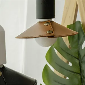 Brown leather camping lampshade retro style light cover with metal snap buttons for use.