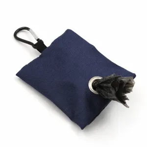 Canvas dog waste bag holder detail view, durable pet poop bag dispenser with metal carabiner.