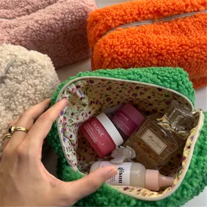 Fluffy teddy fleece cosmetic bag with floral lining, large capacity portable makeup wash pouch.