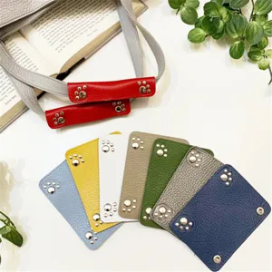 Multicolor leather bag handle wrap detachable strap cover purse accessories detail.