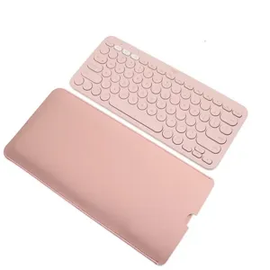 Conjunto de teclado inalámbrico rosa y estuche de almacenamiento de cuero PU.