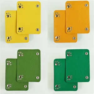 Multicolor leather bag handle wrap, snap button anti-strangling luggage grip accessory.