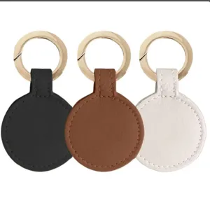 Set clip cappello in pelle rotonda e ciondolo borsa con anelli dorati per esterno.