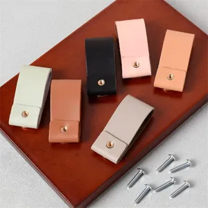 Leather cabinet pulls handles set drawer knobs with gold screws for furniture decor detail view.