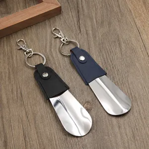 Portable metal shoehorn keychain with leather wrap, short mini shoe helper for travel daily use.