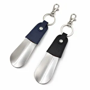 Portable metal shoehorn with leather sleeve and keychain short shoe helper for daily use.