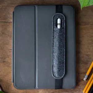 Detail view of grey felt tablet stylus pen holder with elastic band for iPad pencil.