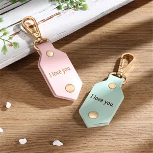 Chic leather keychain set with gold hardware, sweet love quote print, perfect gift for couples.