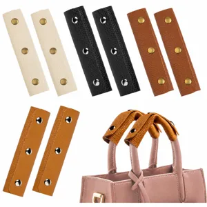 PU leather bag handle wrap detail, snap button luggage grip cover for tote bags and travel purses.
