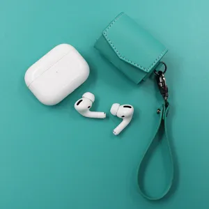 Étui de protection en cuir PU pour écouteurs sans fil avec dragonne et crochet.