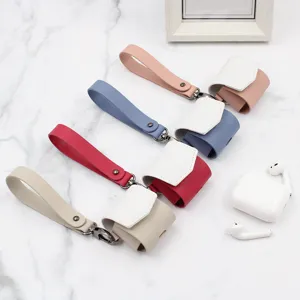 PU leather wireless earphone case with hand strap, protective cover for charging box, stylish.