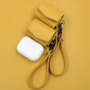 Étui de protection en cuir PU pour écouteurs sans fil avec dragonne, housse portable.