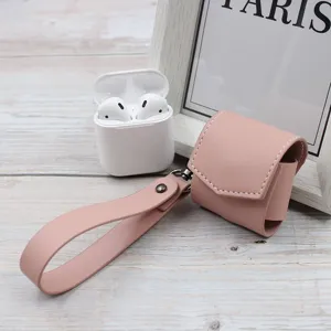 Pink PU leather wireless earphone case detail view, stylish protective cover with strap.