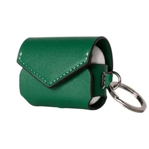 Green PU leather wireless earphone protective case with envelope flap design and keychain.