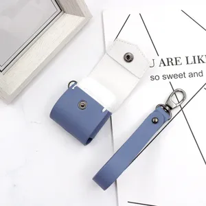Blue white PU leather AirPods case with hand strap, protective cover for wireless earphones.