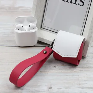Detailed view of the red and white leather earphone case with a convenient hand strap.